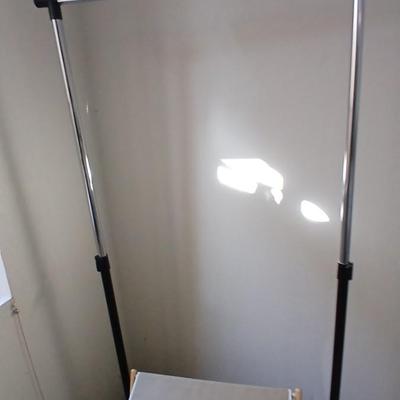 Adjustable clothing rack and canvass clothes hamper