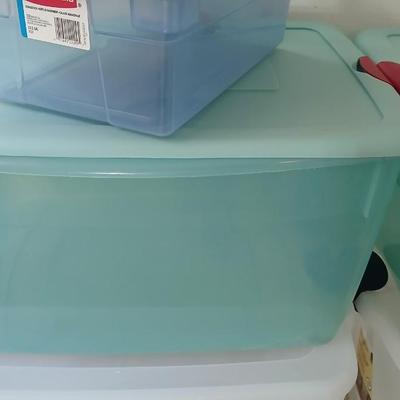 Five totes 4 large sized and one smaller tote with lids