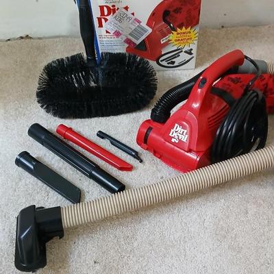 Small handheld Royal Dust Devil vacuum and attachments with ceiling fan brush