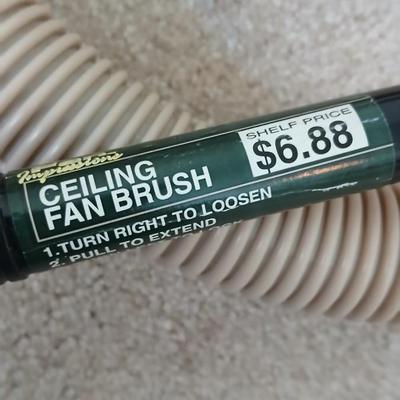 Small handheld Royal Dust Devil vacuum and attachments with ceiling fan brush