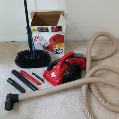 Small handheld Royal Dust Devil vacuum and attachments with ceiling fan brush