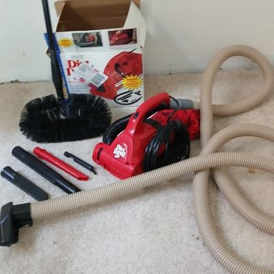 Small handheld Royal Dust Devil vacuum and attachments with ceiling fan brush