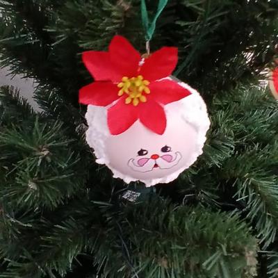 Faux Christmas tree with all the embellishments Ornaments, large candy canes, new tree topper and more