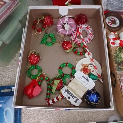 Faux Christmas tree with all the embellishments Ornaments, large candy canes, new tree topper and more