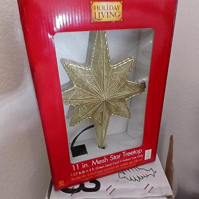 Faux Christmas tree with all the embellishments Ornaments, large candy canes, new tree topper and more