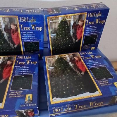 Brand new indoor / outdoor tree wrap lights with light up orb and a foot switch extension cord