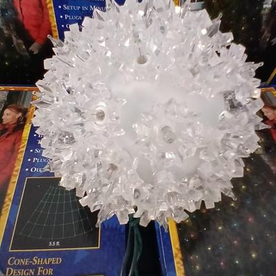 Brand new indoor / outdoor tree wrap lights with light up orb and a foot switch extension cord