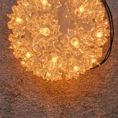 Brand new indoor / outdoor tree wrap lights with light up orb and a foot switch extension cord