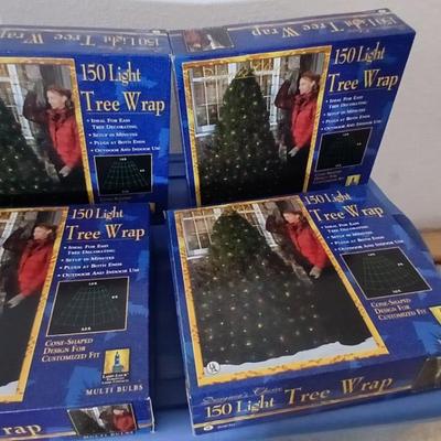 Brand new indoor / outdoor tree wrap lights with light up orb and a foot switch extension cord