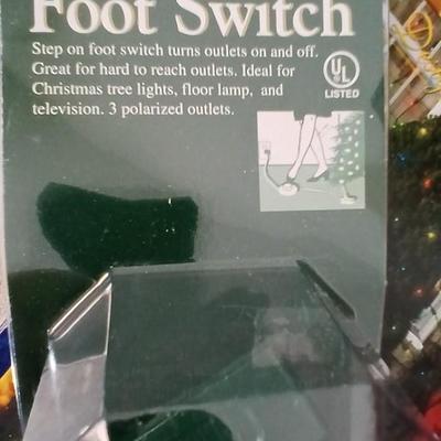 Brand new indoor / outdoor tree wrap lights with light up orb and a foot switch extension cord