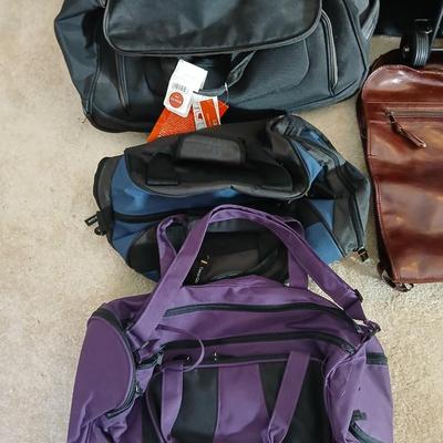 Carry on type duffle bag luggage with adjustable two wheeled luggage cart