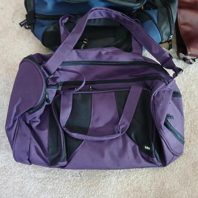 Carry on type duffle bag luggage with adjustable two wheeled luggage cart