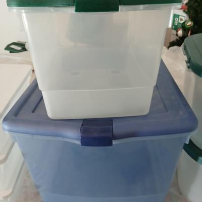 Collection of small storage totes with lids