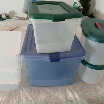 Collection of small storage totes with lids