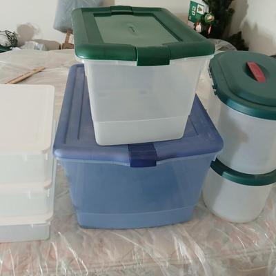 Collection of small storage totes with lids