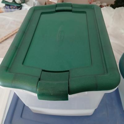Collection of small storage totes with lids