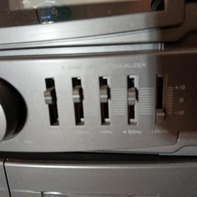 Stereo system CD player, Tuner, Dual cassette, Record player with 2 speakers and collection of cd's and cassettes