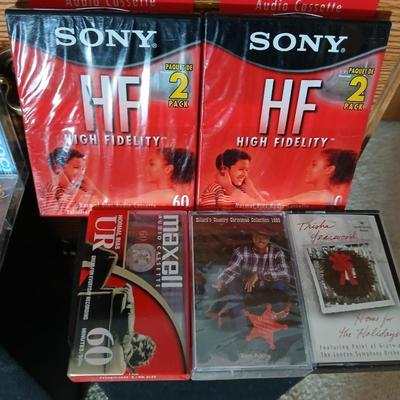 Stereo system CD player, Tuner, Dual cassette, Record player with 2 speakers and collection of cd's and cassettes
