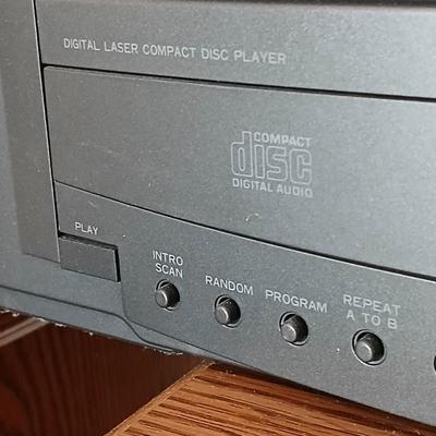 Stereo system CD player, Tuner, Dual cassette, Record player with 2 speakers and collection of cd's and cassettes