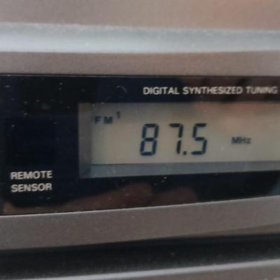 Stereo system CD player, Tuner, Dual cassette, Record player with 2 speakers and collection of cd's and cassettes