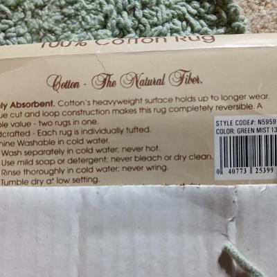 Brand new four-piece Green Mist bath rug set