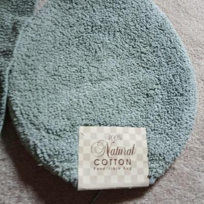 Brand new four-piece Green Mist bath rug set