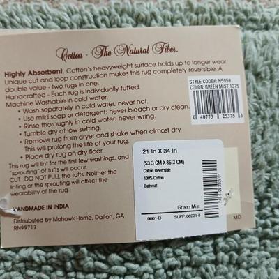 Brand new four-piece Green Mist bath rug set