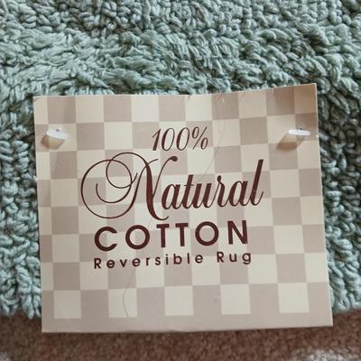 Brand new four-piece Green Mist bath rug set
