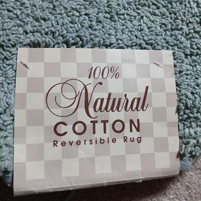 Brand new four-piece Green Mist bath rug set