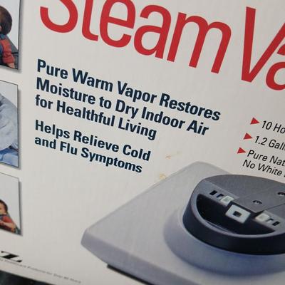 Kaz King size moist heat pad, Steam Vaporizer, and water bottle / sytinge combination