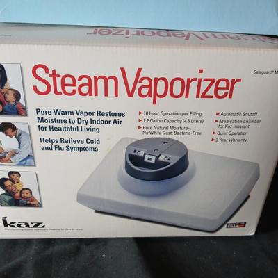 Kaz King size moist heat pad, Steam Vaporizer, and water bottle / sytinge combination