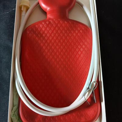 Kaz King size moist heat pad, Steam Vaporizer, and water bottle / sytinge combination