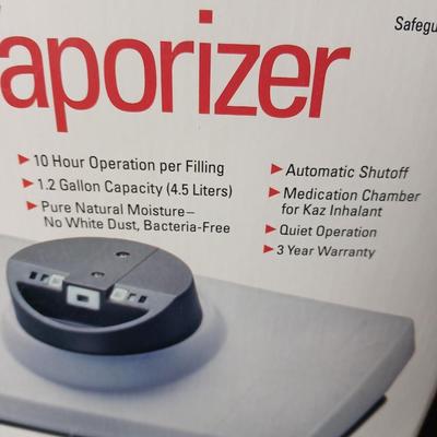 Kaz King size moist heat pad, Steam Vaporizer, and water bottle / sytinge combination