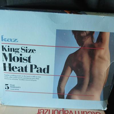 Kaz King size moist heat pad, Steam Vaporizer, and water bottle / sytinge combination