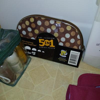Ladies' spa day! Candles, makeup stoage bags, new shower liner, bath towel, and more