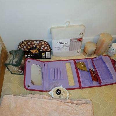 Ladies' spa day! Candles, makeup stoage bags, new shower liner, bath towel, and more