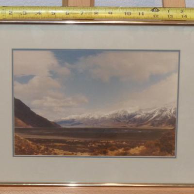 Sale Photo Thumbnail #57: Nestled in the embrace of New Zealand's South Island lies a picturesque valley cradled between the majestic peaks of Mount Tasman and Mount Cook. This enchanting photograph, captured by the talented MaryPat in September 1983, measures 16 by 12 inches, imm