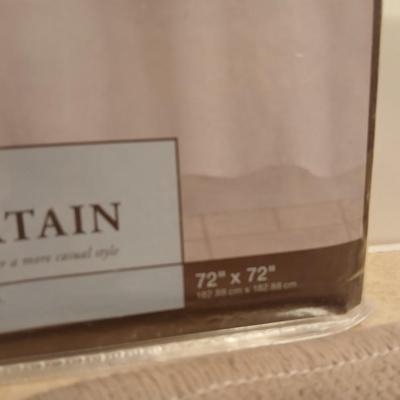 Two rubber backed rugs with a new shower curtain liner