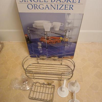 Single basket organizer with chrome bathtub organizers and hooks