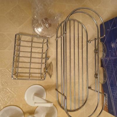 Single basket organizer with chrome bathtub organizers and hooks