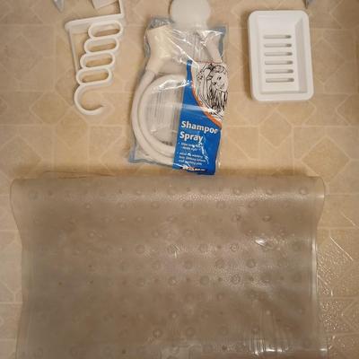 White organizing baskets Rubber tub mat Bathroom scale and other bathroom essentials