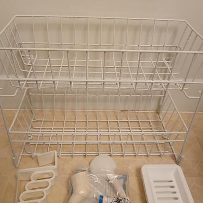 White organizing baskets Rubber tub mat Bathroom scale and other bathroom essentials
