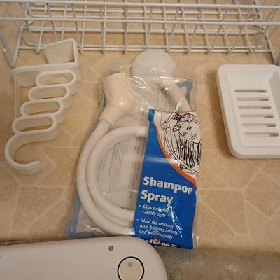 White organizing baskets Rubber tub mat Bathroom scale and other bathroom essentials