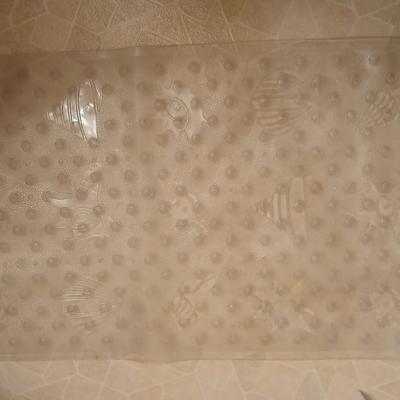 White organizing baskets Rubber tub mat Bathroom scale and other bathroom essentials