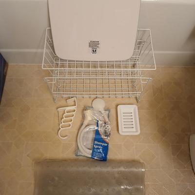 White organizing baskets Rubber tub mat Bathroom scale and other bathroom essentials