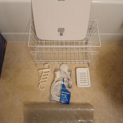 White organizing baskets Rubber tub mat Bathroom scale and other bathroom essentials