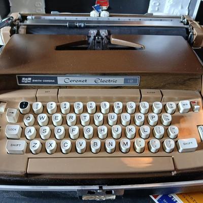 Classic! Smith Corona Coronet electric 12 typewriter with case. APPEARS BRAND NEW!!