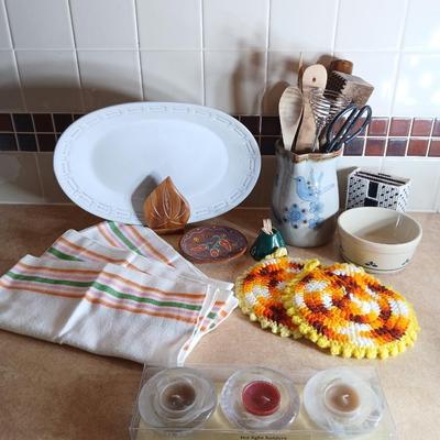 Assortment of Kitchen items, Utensils with holder, towels, platter, candles and hot pads