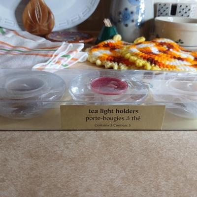 Assortment of Kitchen items, Utensils with holder, towels, platter, candles and hot pads