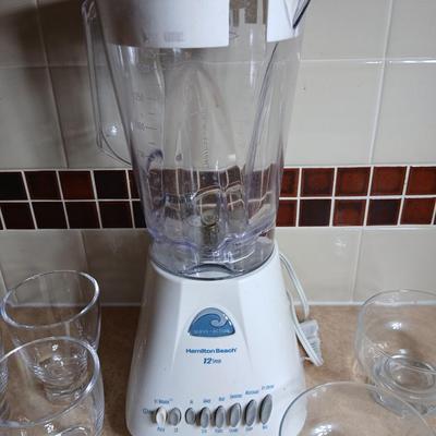 Nice Hamilton Beach 12 speed wave action blender with cups for your shakes and smoothies